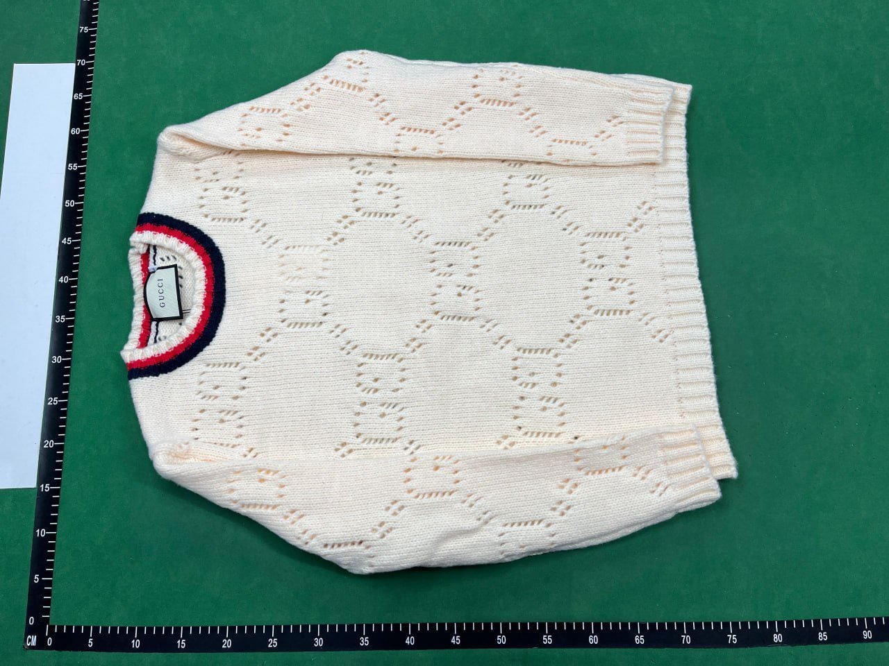 Gucci GG Supreme Knitted Sweater & Down Jacket Collection